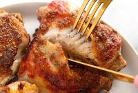 Crispy Oven-Baked Chicken Thighs with Garlic and Herbs