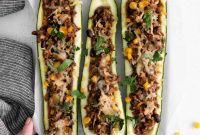 Baked Stuffed Zucchini Boats with Cheese and Herbs