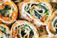 Cheesy Baked Turkey and Spinach Pinwheels Recipe