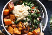 Mediterranean Vegan Buddha Bowl with Quinoa and Hummus