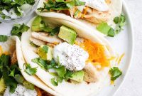 Slow Cooked Shredded Chicken Tacos with Cilantro Lime Slaw