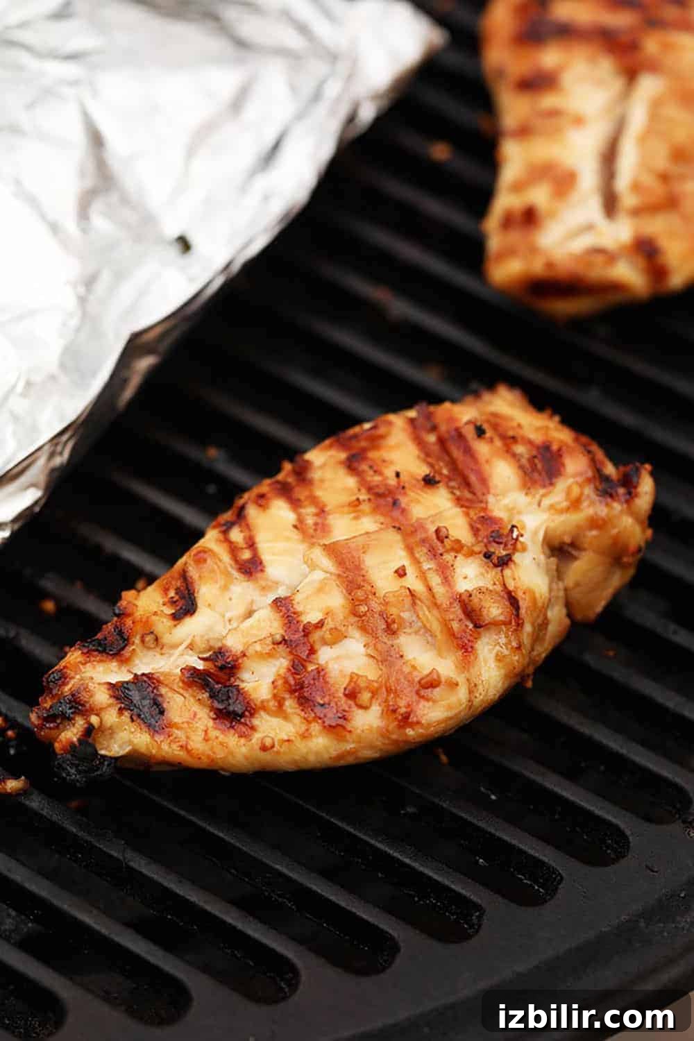 How to Grill Juicy Chicken Every Time 4 grilling chicken on grill.