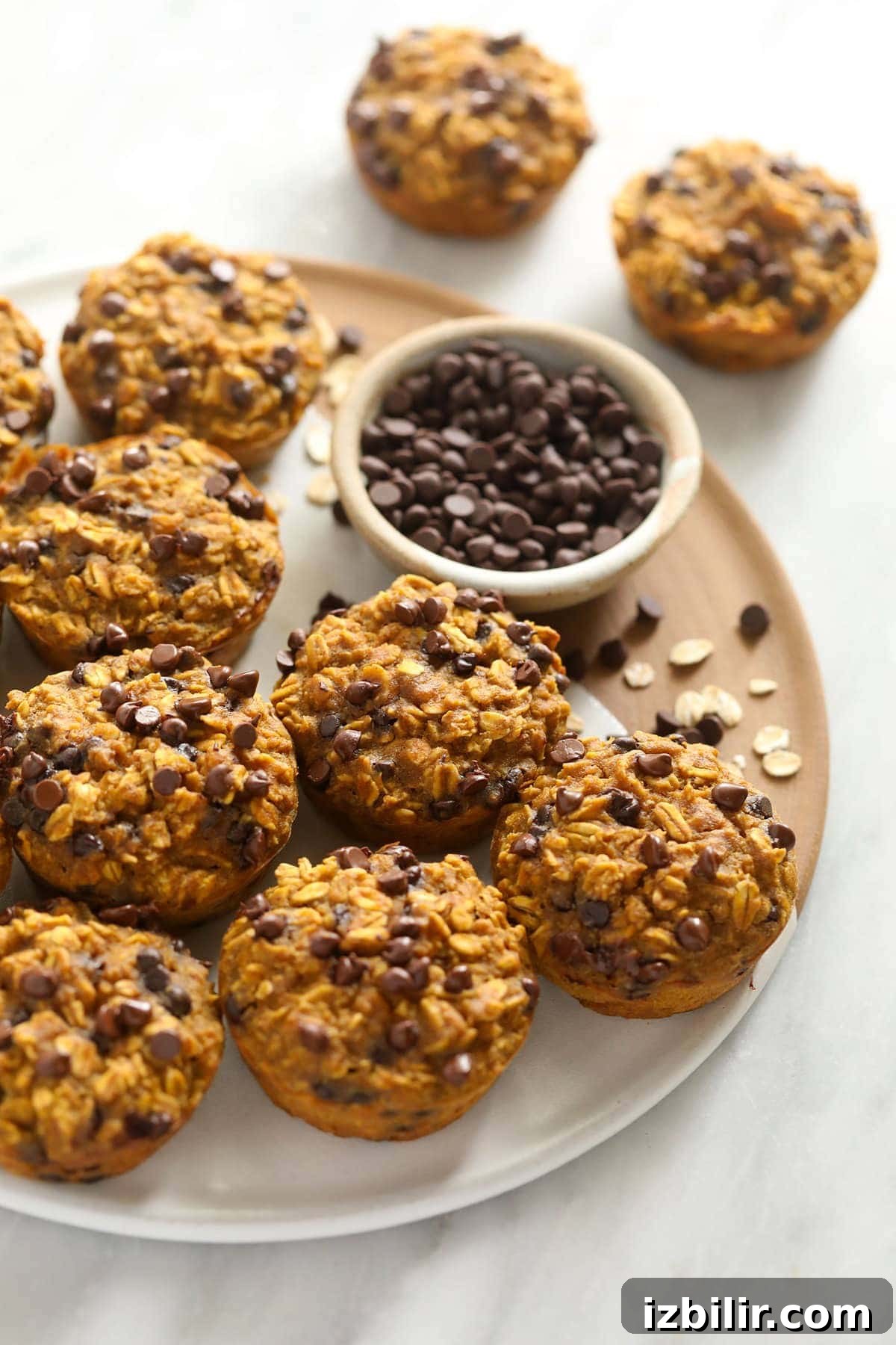 Make Ahead Pumpkin Oatmeal Cups Recipe 5 Pumpkin oatmeal cups on a tray.