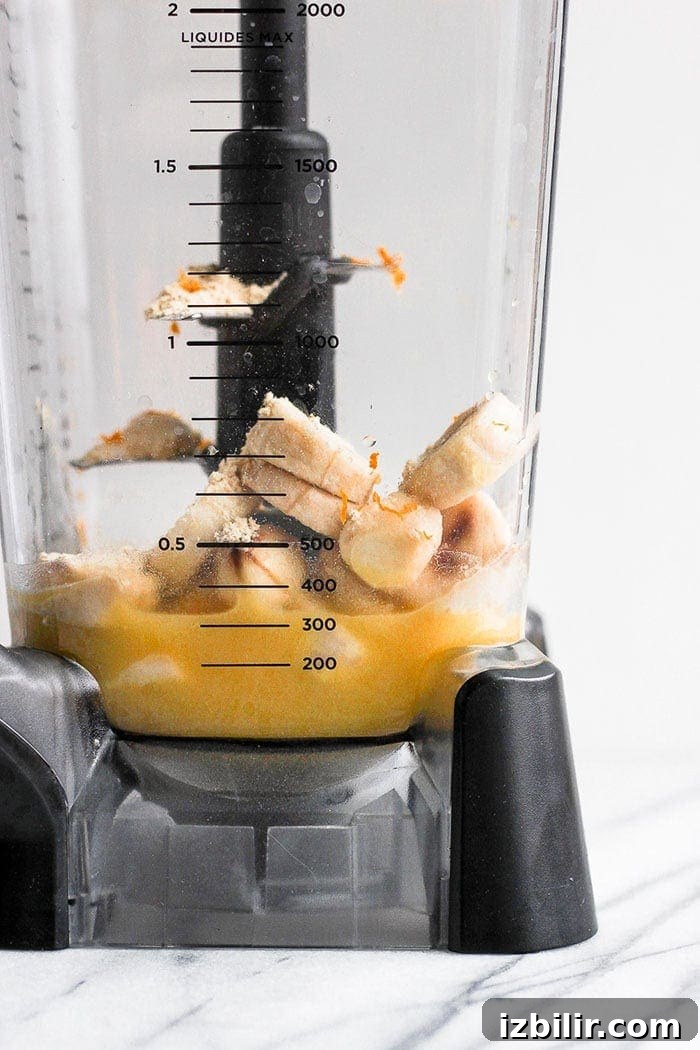 Looking for the orange smoothie of your dreams? Try our magical vitamin C-packed Orange Creamsicle Smoothie. You only need 3 ingredients + a few nummy add-ins! orange smoothie in blender