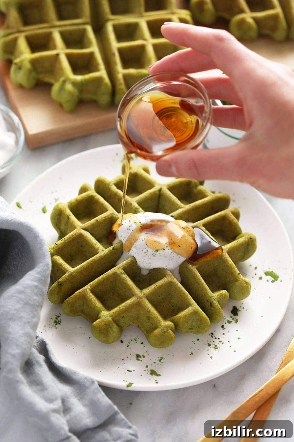 Gluten-Free Matcha Waffles Recipe 2 green tea waffles with syrup
