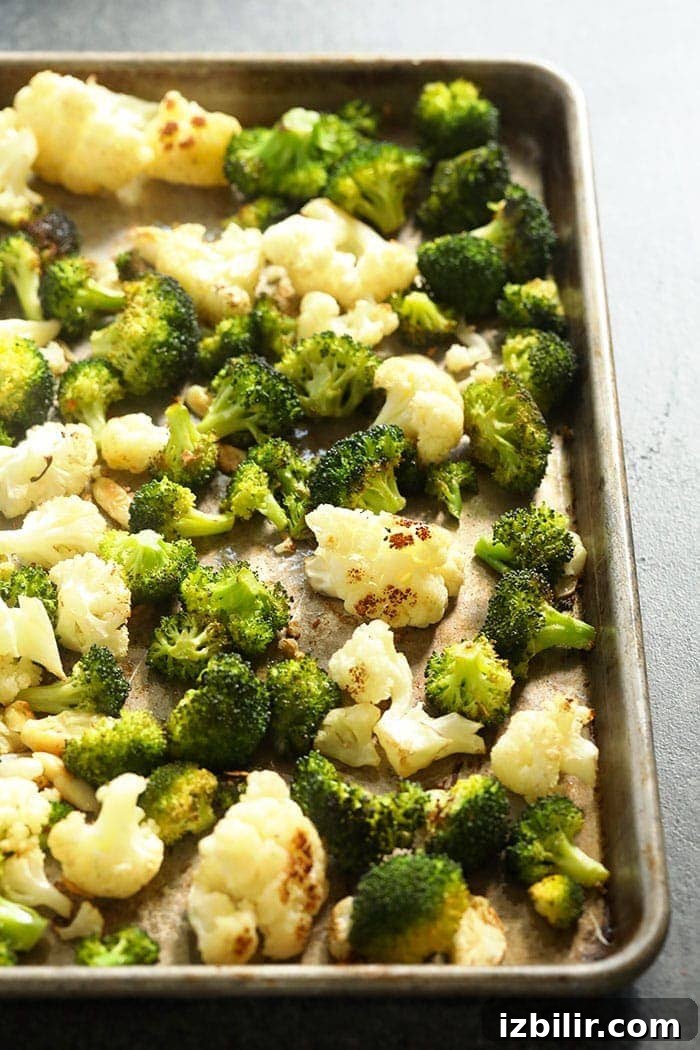 Roasted broccoli and cauliflower Roasted cauliflower and broccoli on a pan