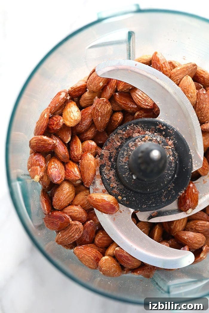 roasted almonds in a food processor.