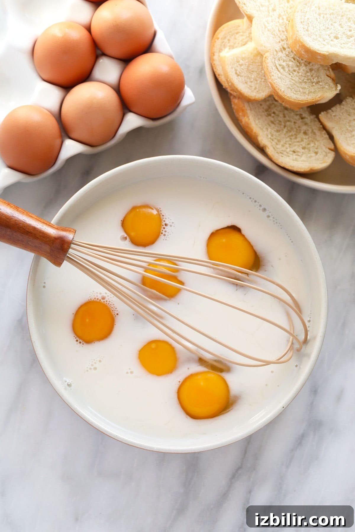 Egg and milk whisked in a bowl
