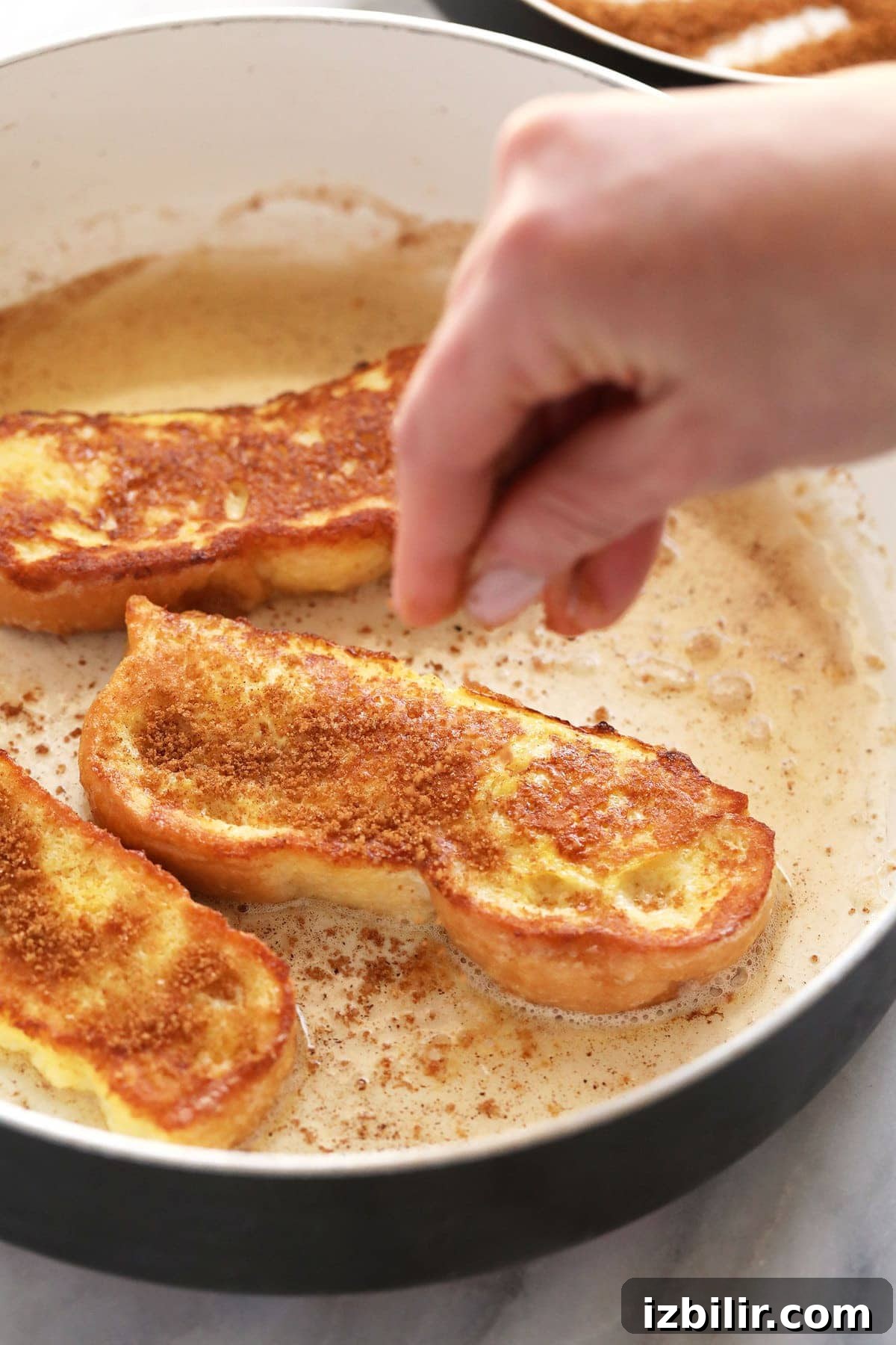 Sprinkling cinnamon sugar