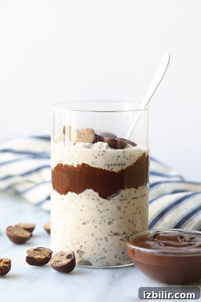 Moose Tracks overnight oats with fudge swirl and cookie dough pieces overnight oatmeal in a jar