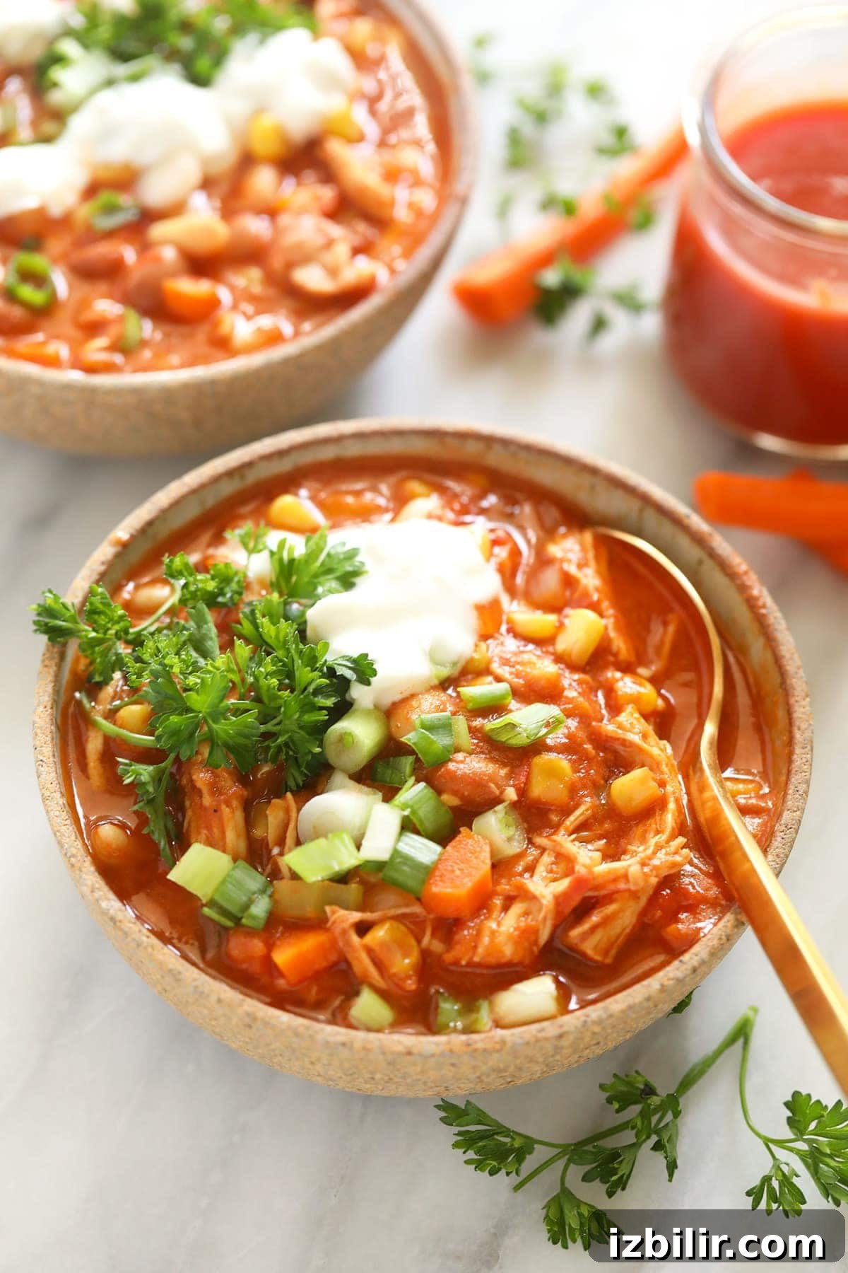 A bowl of buffalo chicken chili ready to serve. chili in bowl
