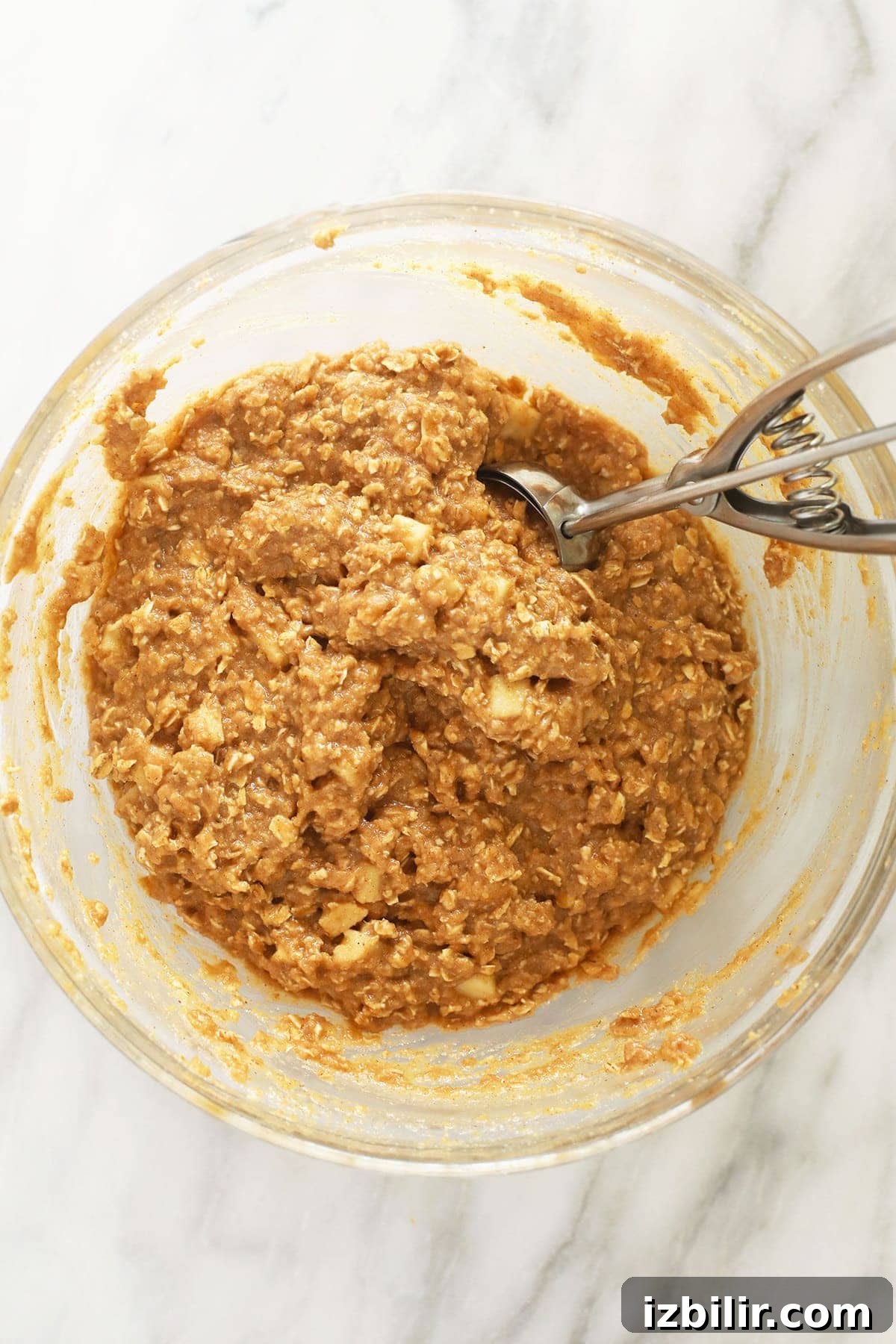Soft Chewy Apple Oatmeal Cookies with Cinnamon 4 Apple oatmeal cookies batter in bowl.