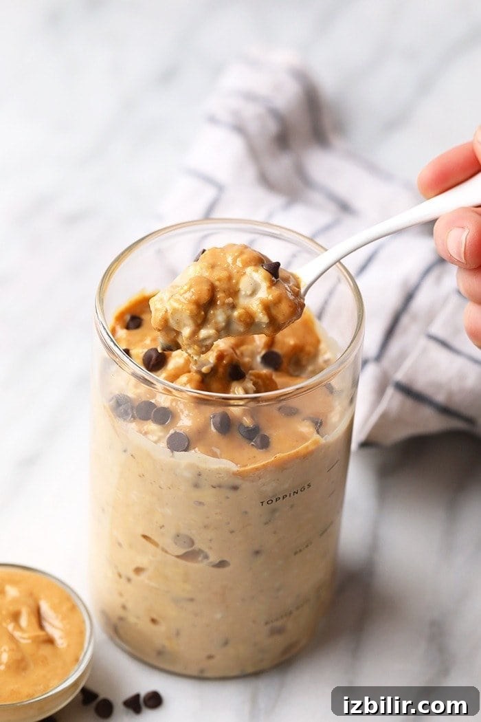 Taking a spoonful of overnight oats