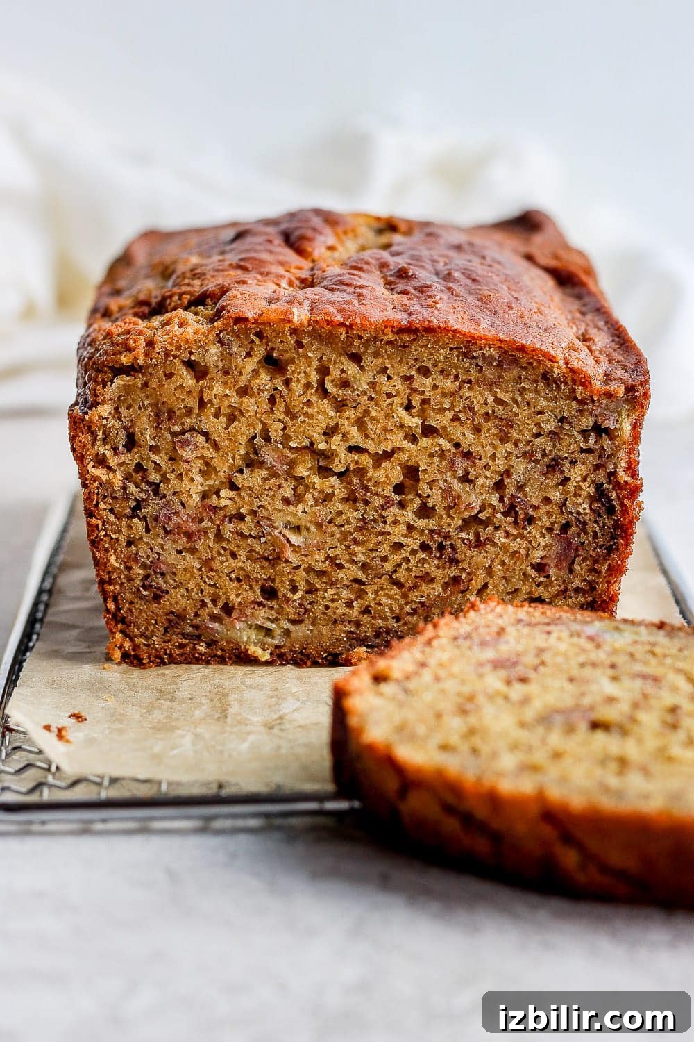 Delicious healthy banana bread loaf of banana bread with a slice cut out