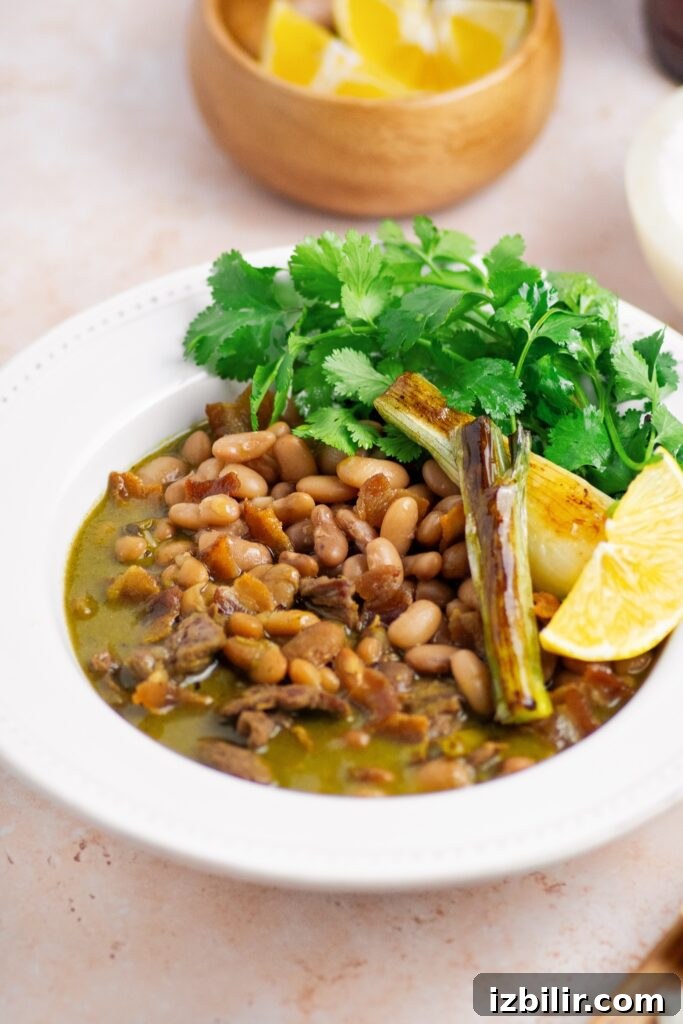 Carne en su Jugo Recipe: Mexican Beef Simmered in Its Juices 3 Carne En Su Jugo simmering in a pot