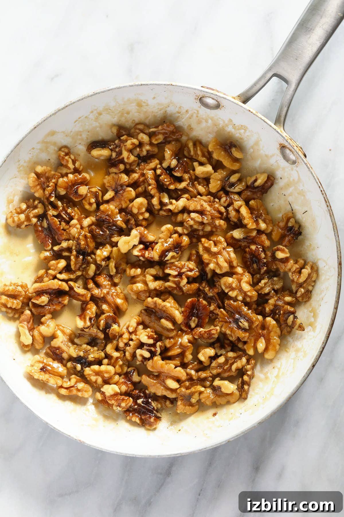 Candied walnuts in a pan