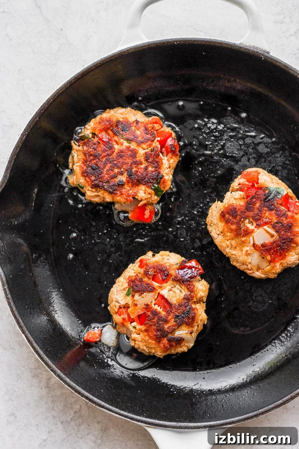 Pan frying salmon patties until golden salmon patties pan frying in a skillet