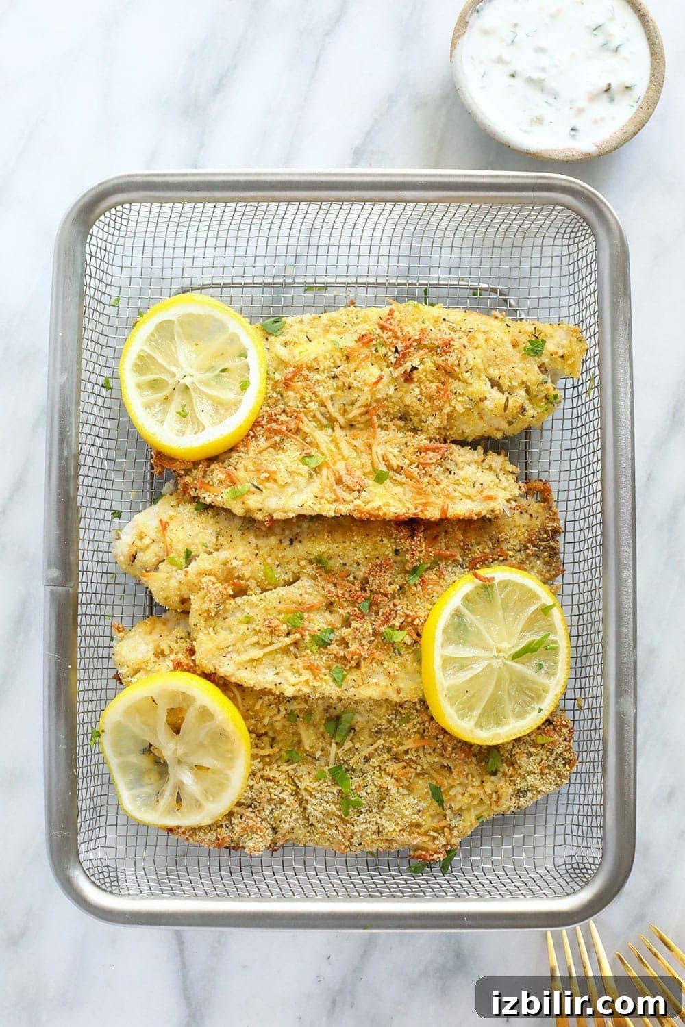 Parmesan crusted tilapia Baked tilapia in a basket.