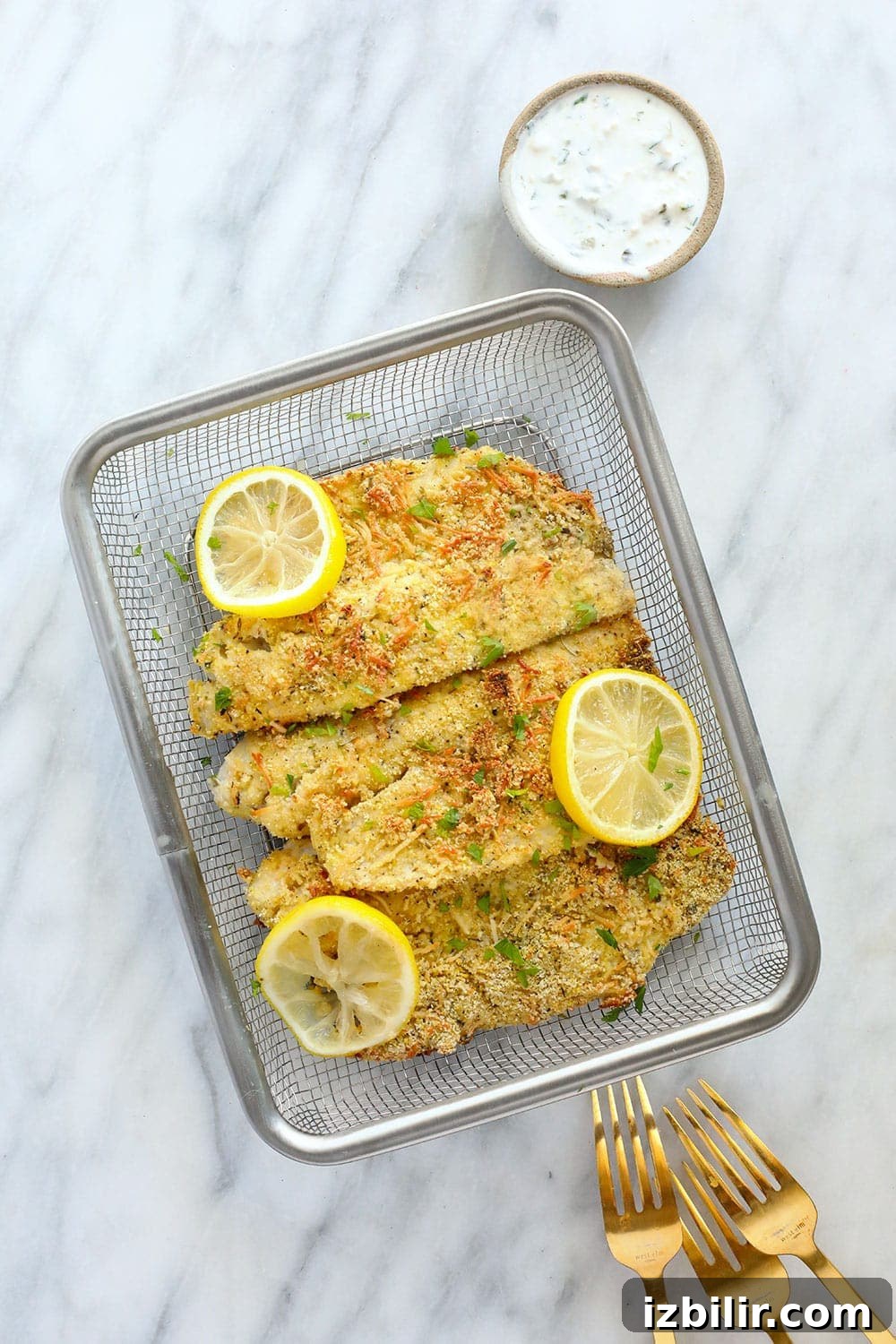 Parmesan crusted tilapia in a basket Parmesan crusted tilapia ready to eat.