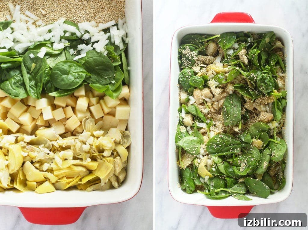All of the ingredients of spinach artichoke quinoa casserole in a casserole dish.