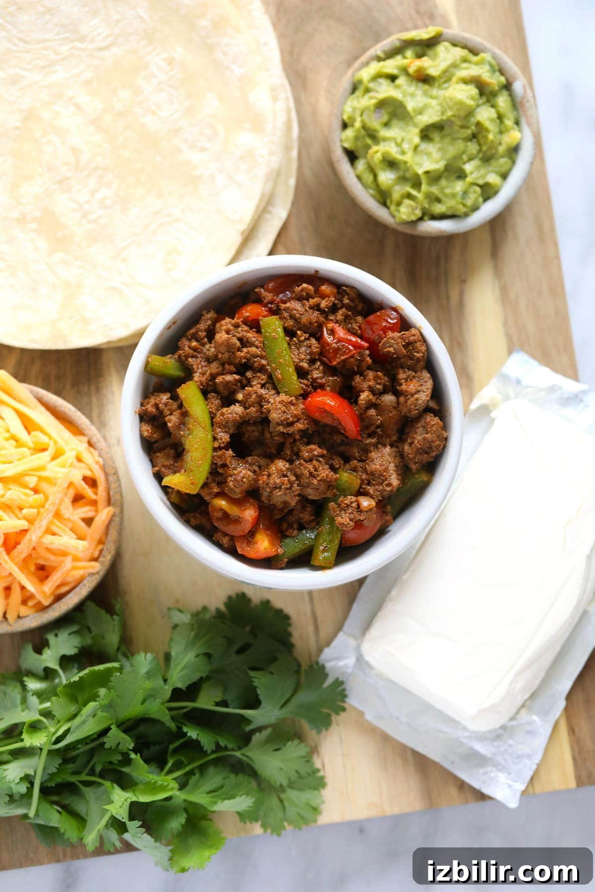 chicken quesadilla ingredients ready to be placed on a tortilla