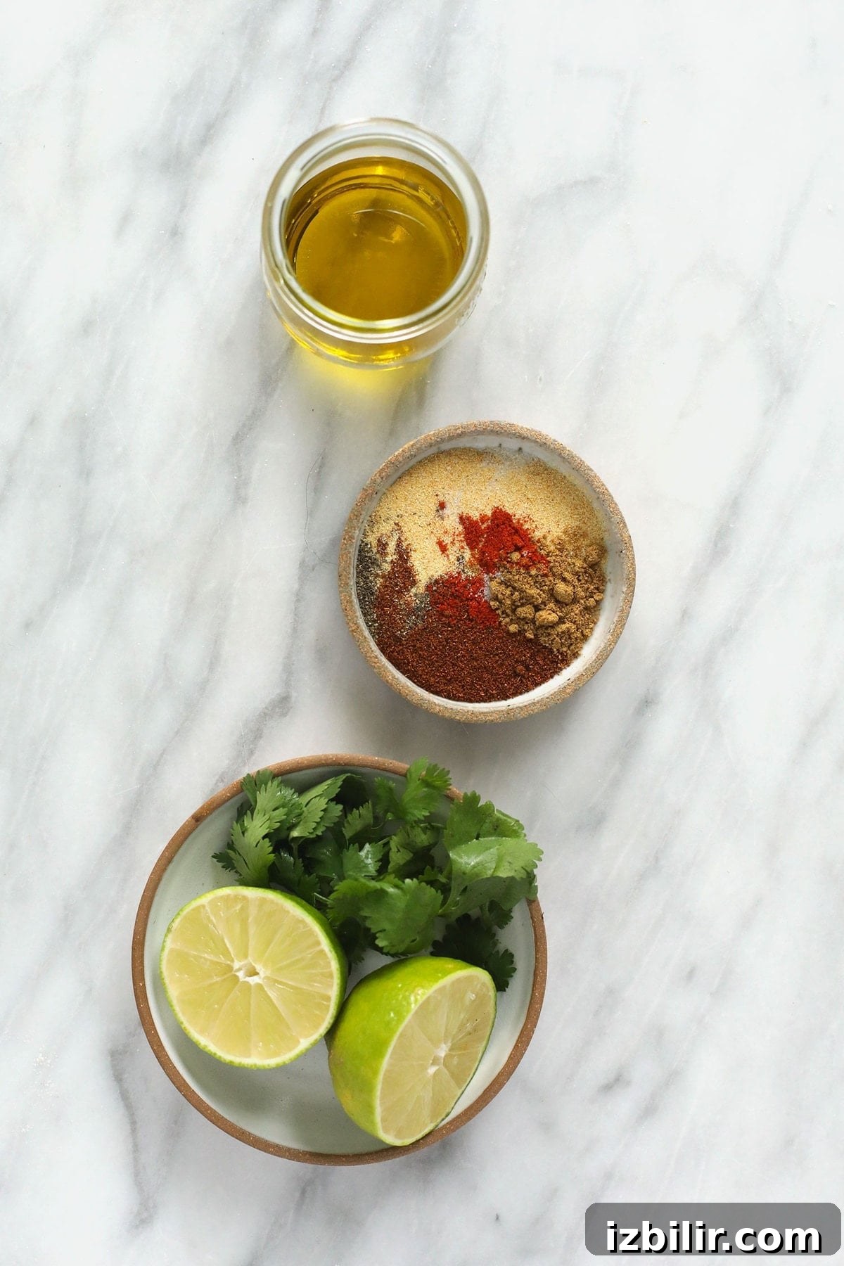 Chicken marinade ingredients in small containers.