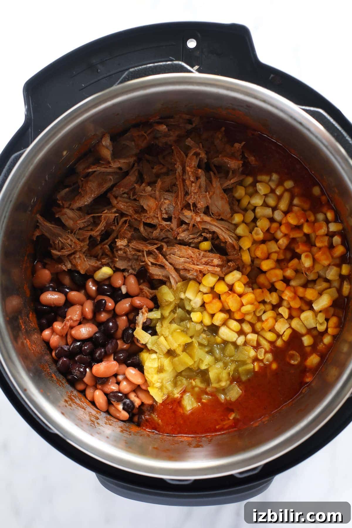 ingredients for pork chili instant pot in pressure cooker.