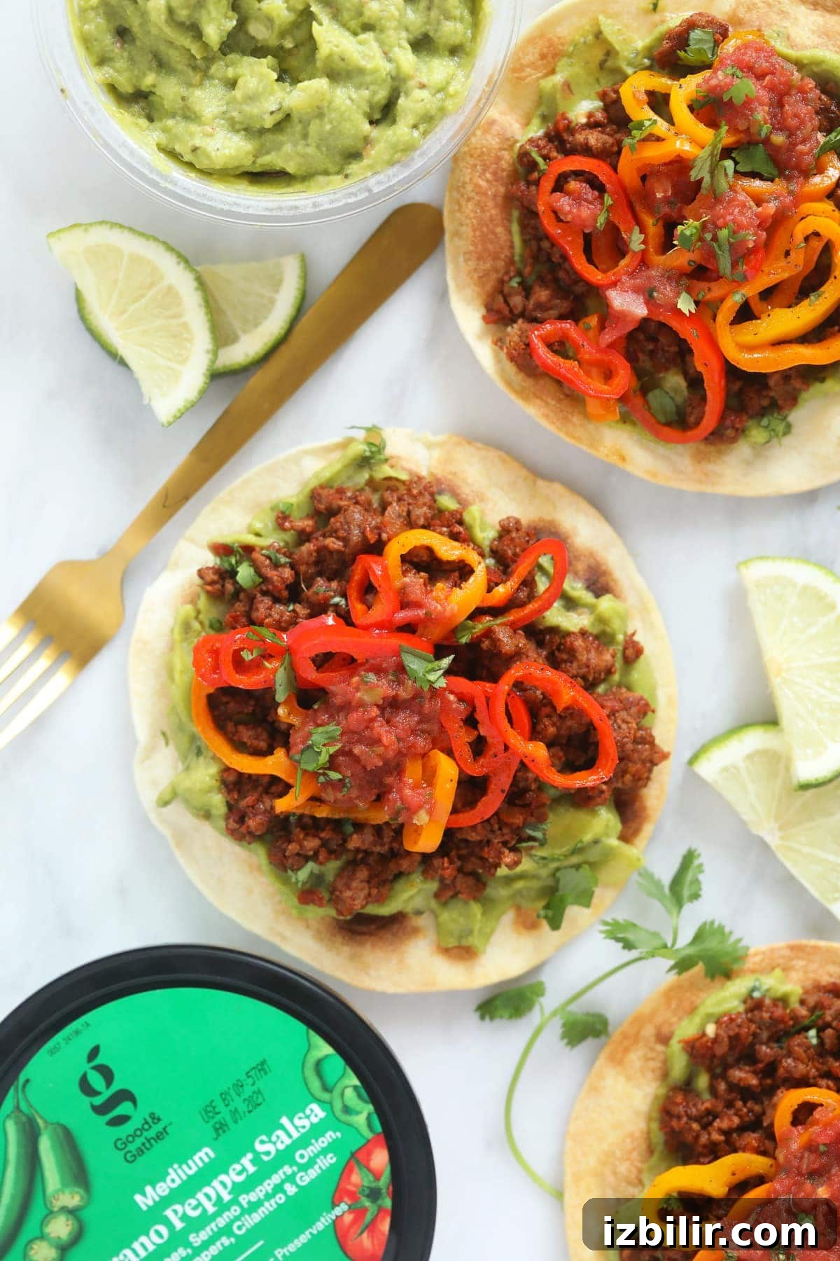 Tostada with peppers and lime tostada with lime wedges and mini sweet peppers