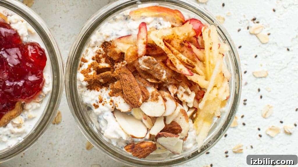 Three bowls of oatmeal with fruit and granola.