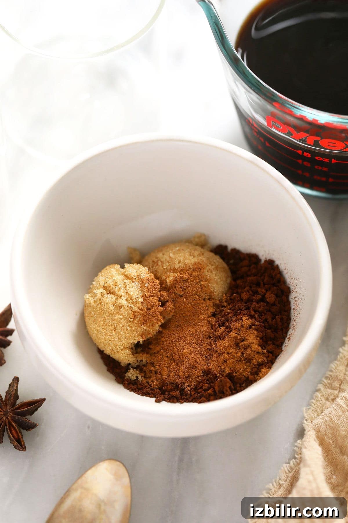 Pumpkin Spice Dalgona Coffee Recipe 3 Brown sugar, instant coffee, and pumpkin spice in a bowl.