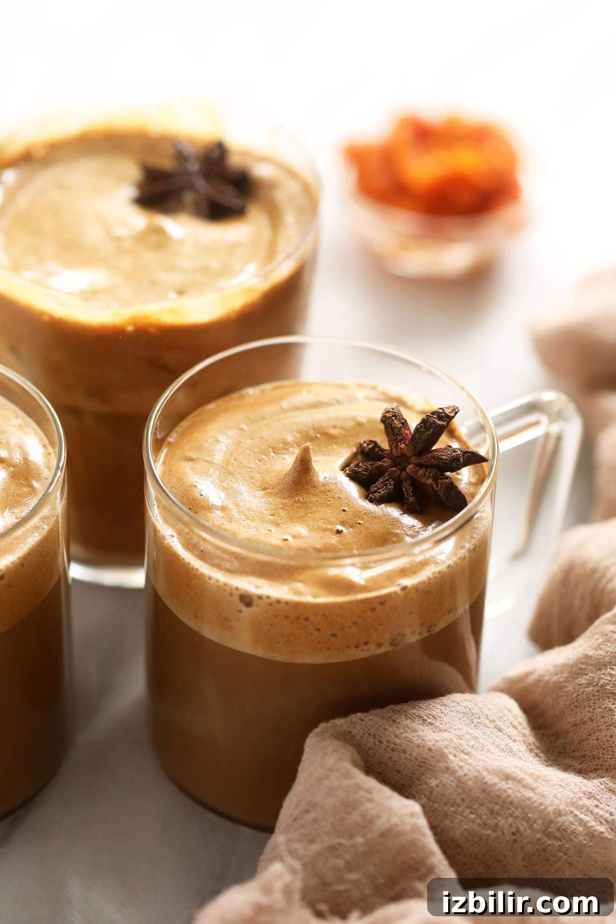 Pumpkin Spice Dalgona Coffee Recipe 7 Hot dalgona coffee in mugs.