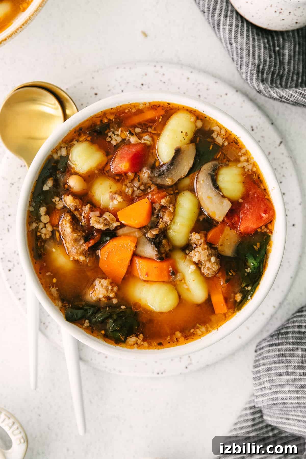 sausage gnocchi soup in a bowl