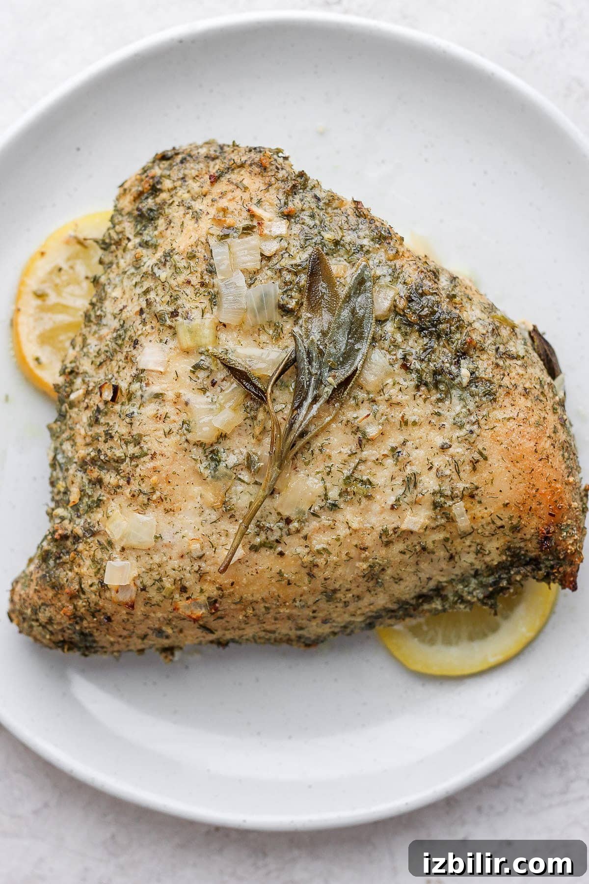 Herb Ranch Roasted Turkey Breast Recipe 6 A roasted turkey breast on a serving platter.