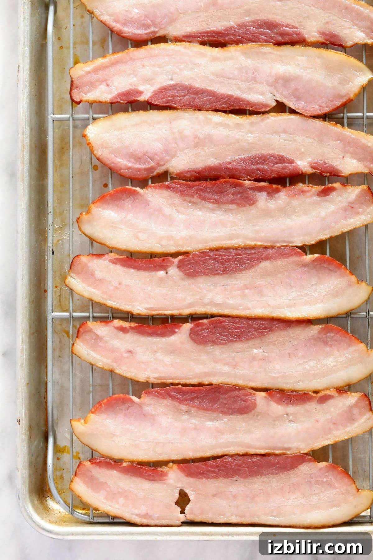 raw bacon ready to be baked