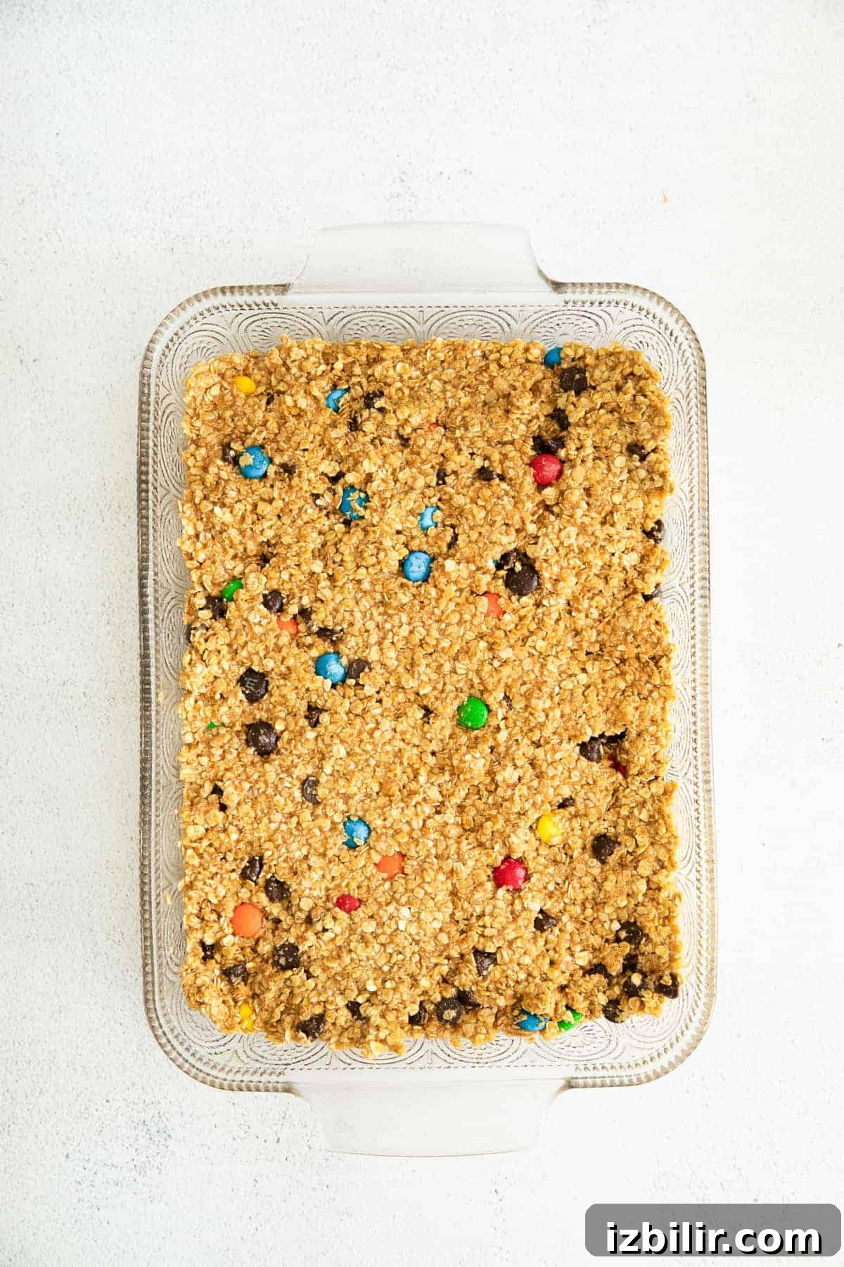 Monster Cookie Bars Recipe: Oats, Peanut Butter & M&Ms 6 Batter pressed into baking dish