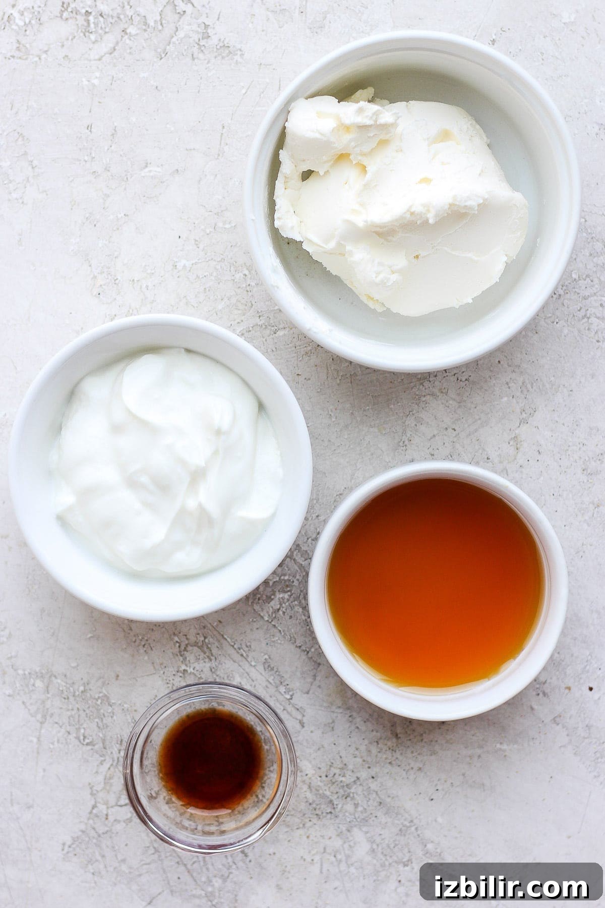 Low-Sugar Cream Cheese Frosting Recipe 2 Cream cheese frosting ingredients in bowls.