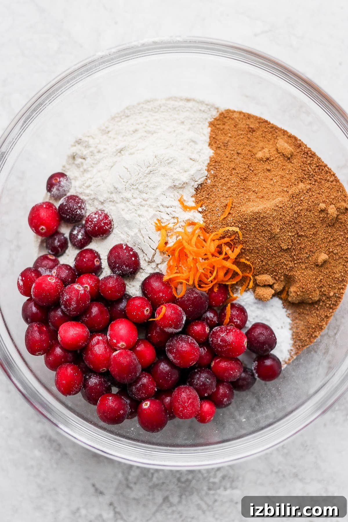 dry ingredients for cranberry orange bread in a bowl