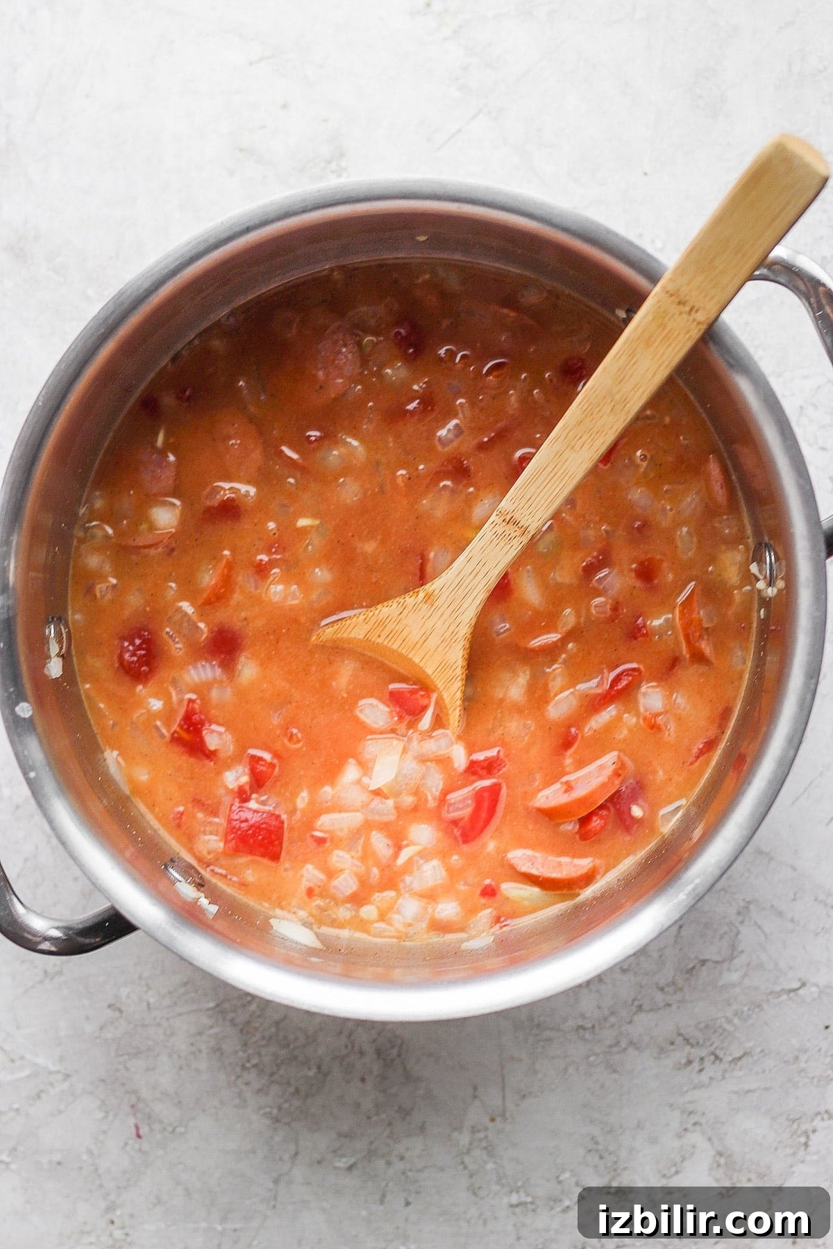 seafood boil broth in a stock pot