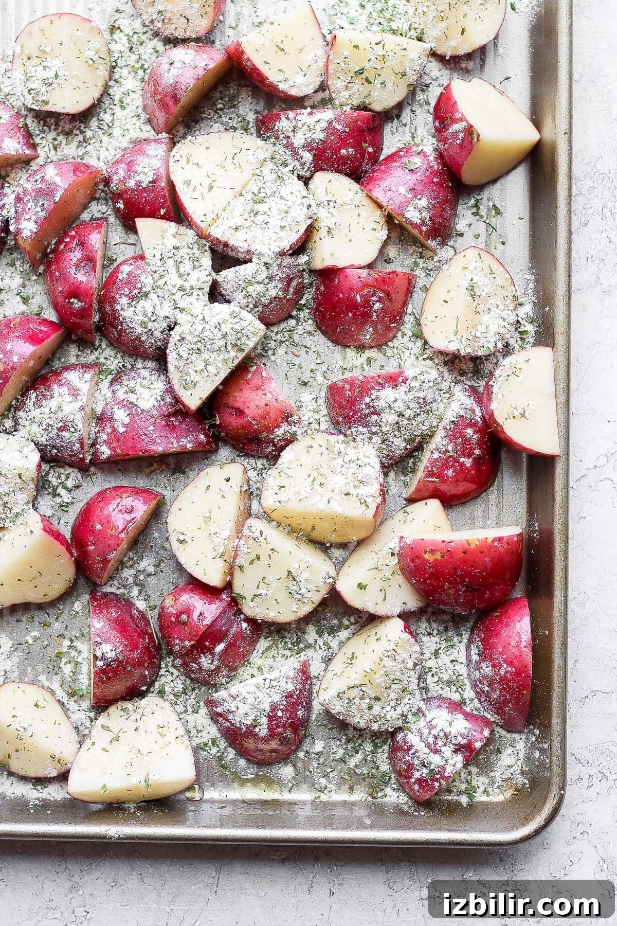 These Ranch Roasted Potatoes are flavor-packed and deliciously crispy! Whip up a batch for the most flavorful side dish. roasted red potatoes sprinkled with ranch seasoning