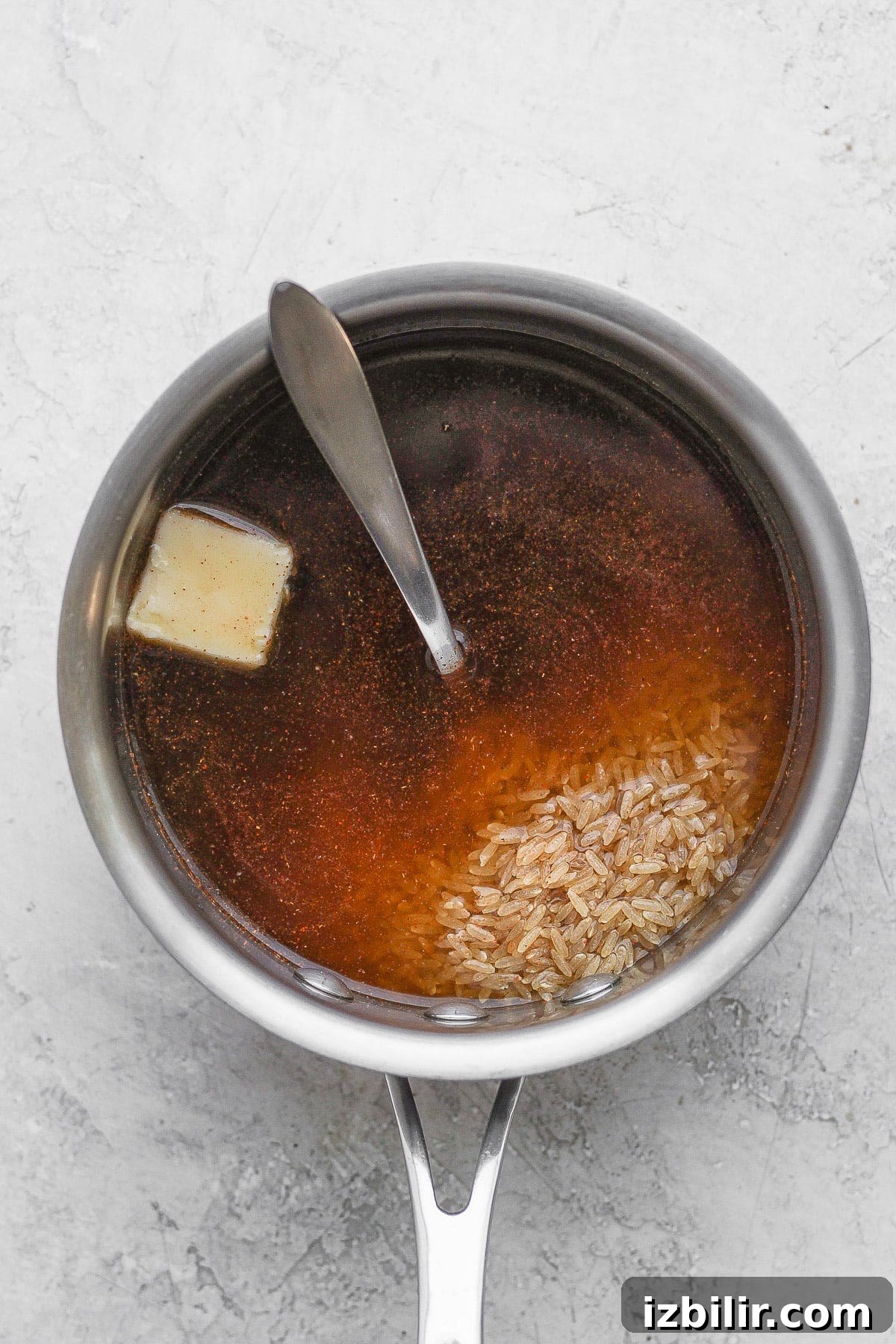 brown rice and beef broth ready to be cooked
