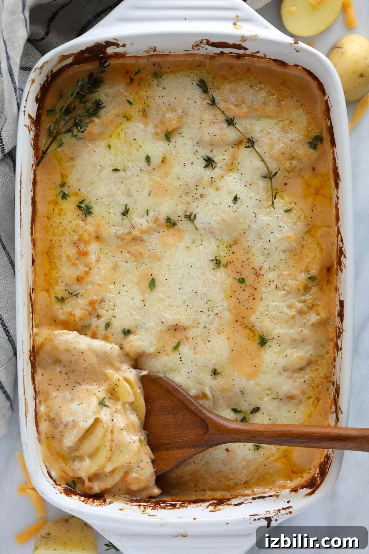 Cheesy potatoes in a casserole dish 