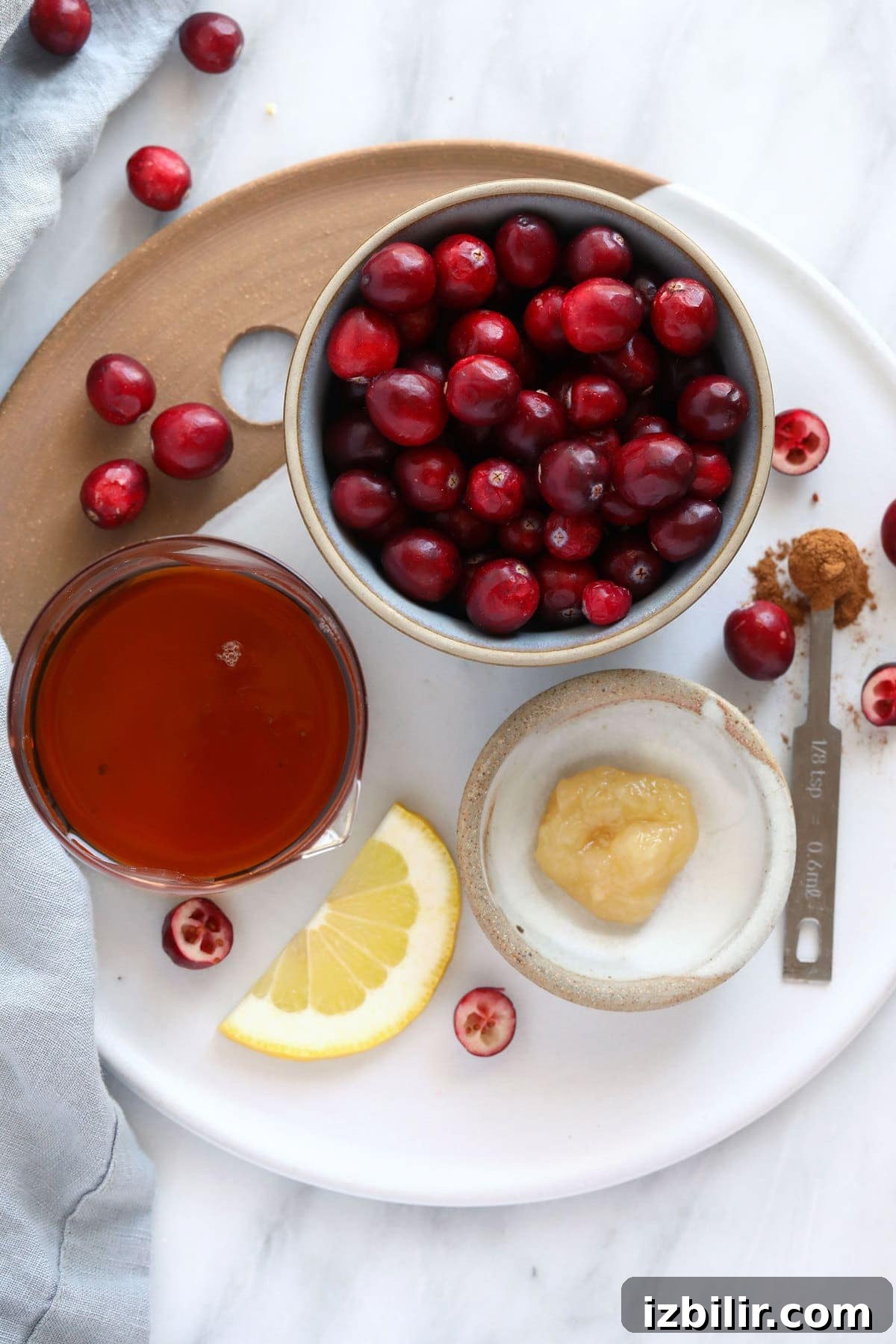 Ingredients for Lemon Ginger Cranberry Sauce cranberry sauce ingredients on plate
