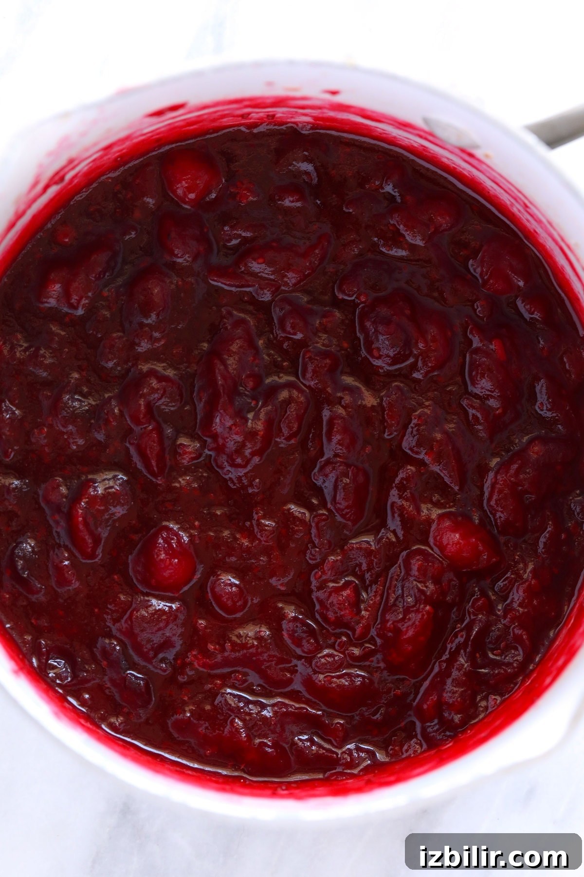 Zesty Lemon-Ginger Cranberry Sauce Recipe 3 cooked cranberry sauce in pot