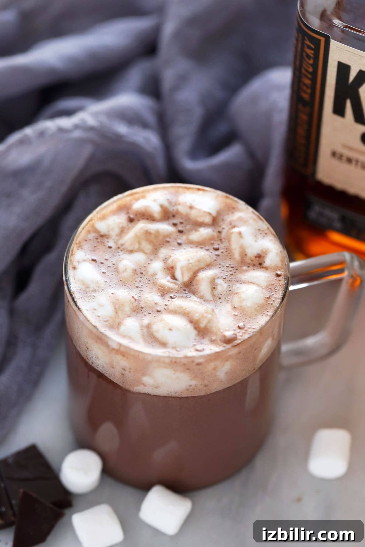 Mug of easy spiked hot chocolate topped with mini marshmallows