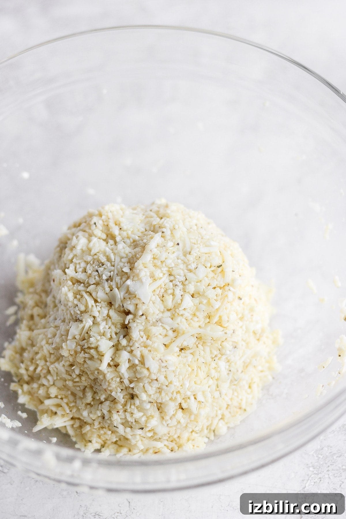 Gluten-Free Cauliflower Pizza Crust Recipe 6 Cauliflower crust ingredients made into a ball.