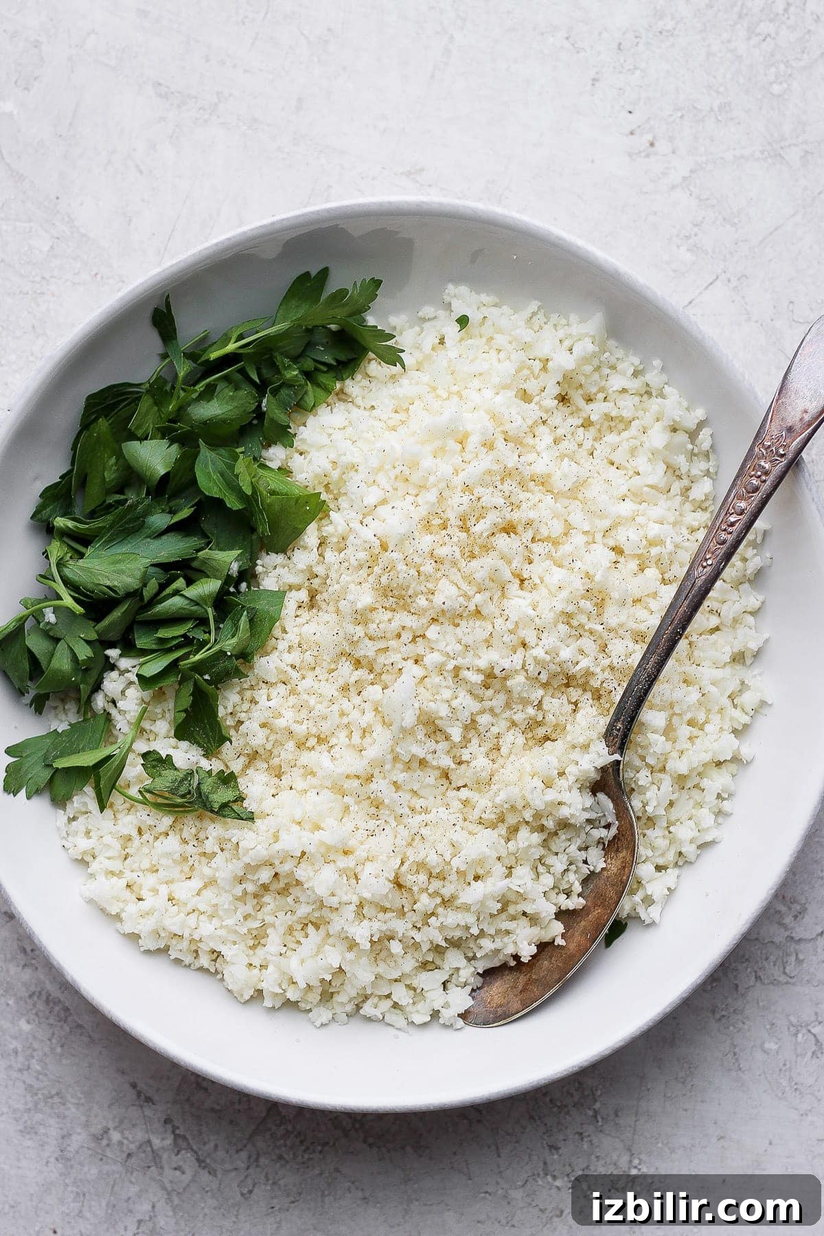 Cauliflower Rice: Quick Low-Carb Recipe 2 Cauliflower rice in a bowl.