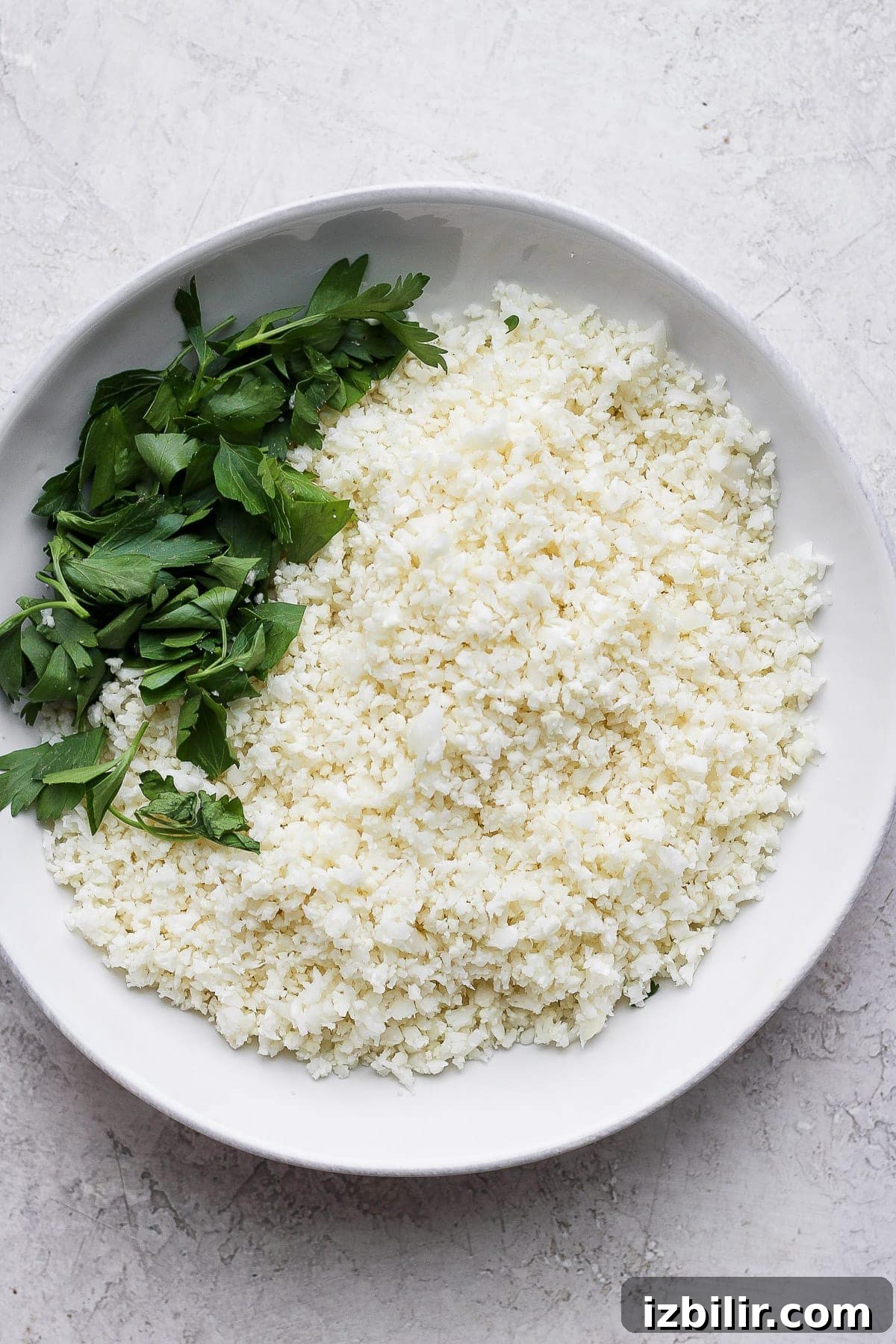 Cauliflower Rice: Quick Low-Carb Recipe 5 Cauliflower rice in a bowl.