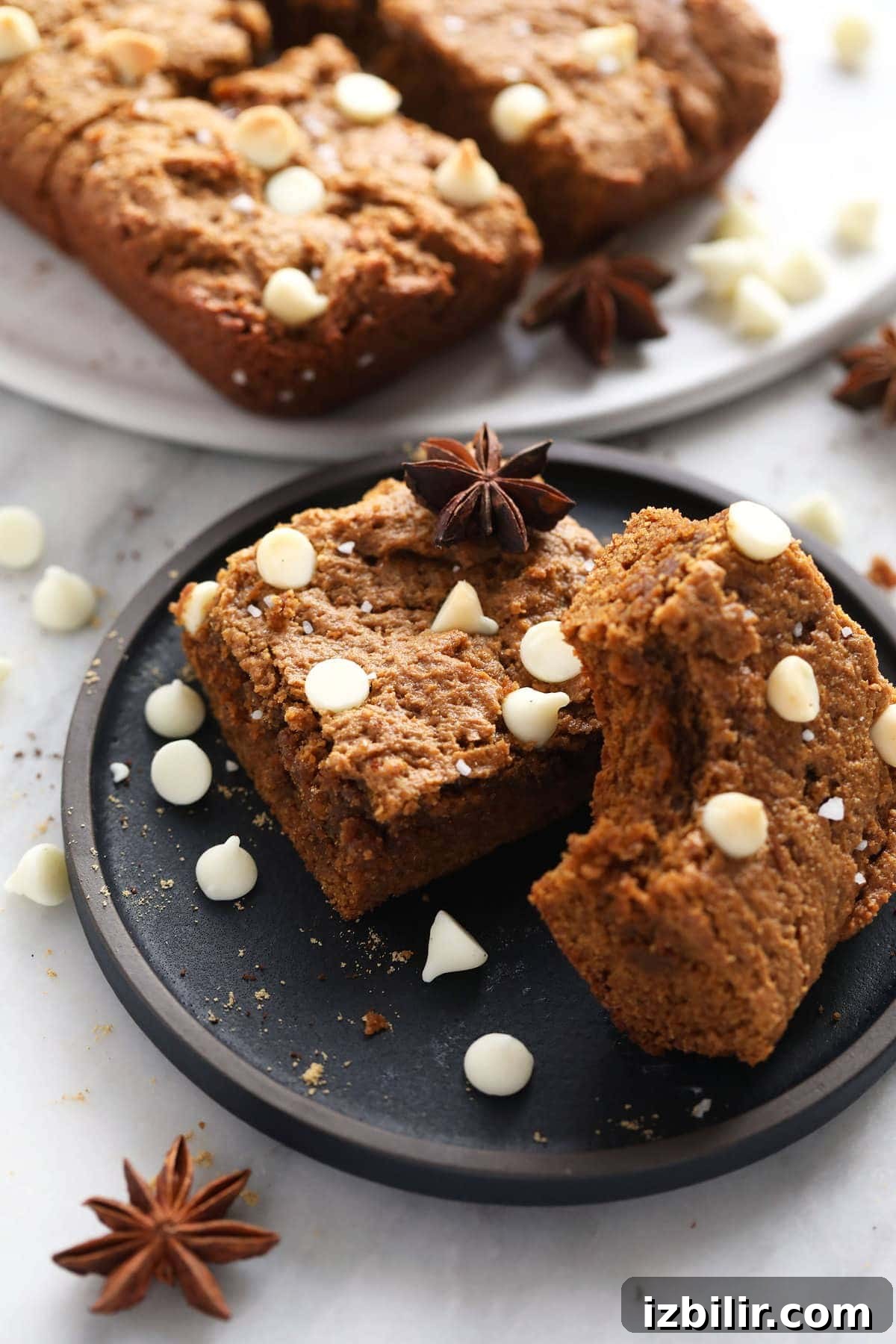 Gingerbread cookie bars topped with white chocolate chips