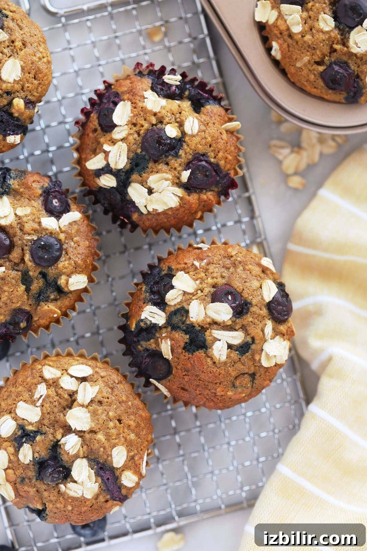 blueberry oatmeal muffins on a cooling rack