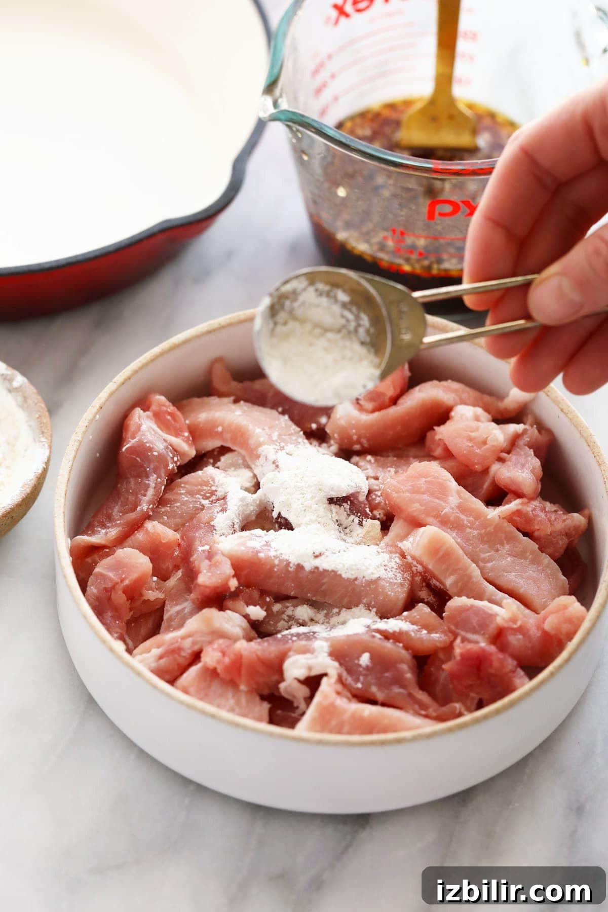 Sticky Honey Pork Recipe and 20 Pork Variations 11 sprinkling pork with cornstarch